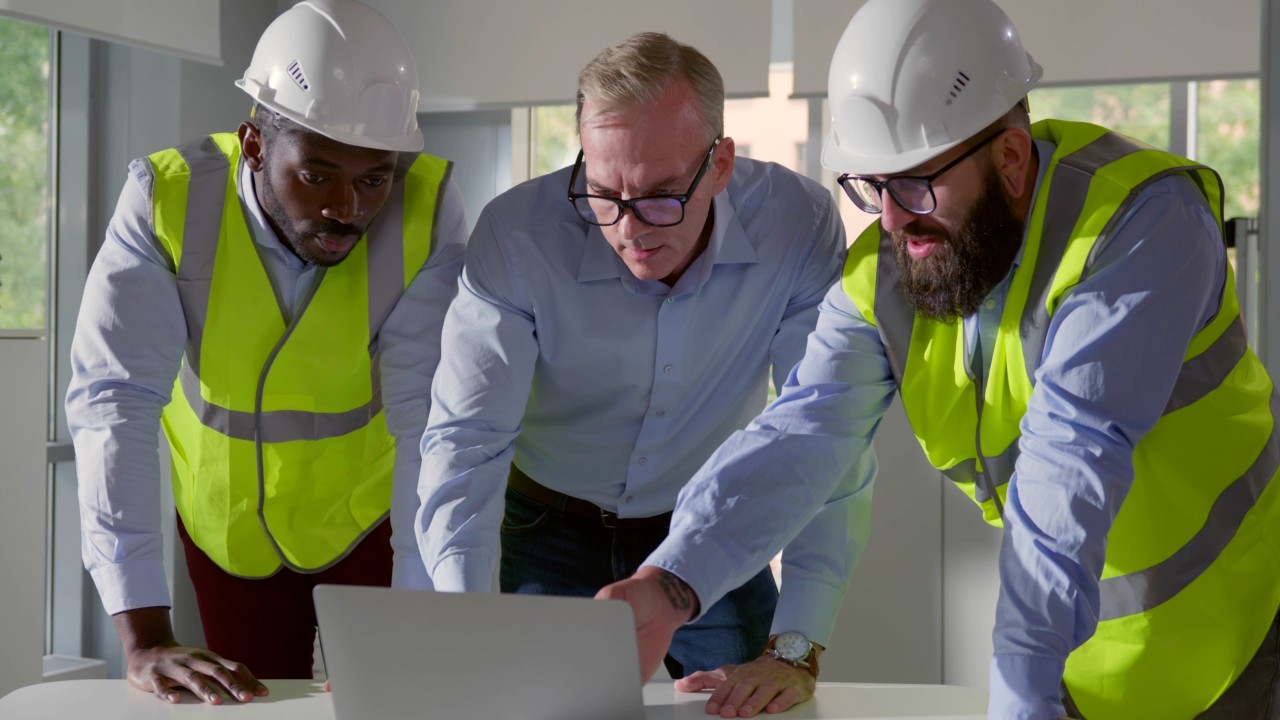 Quality professionals collaborating on a construction project
